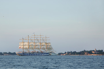 Fototapeta na wymiar A full-rigged ship with traditional mast and sails 