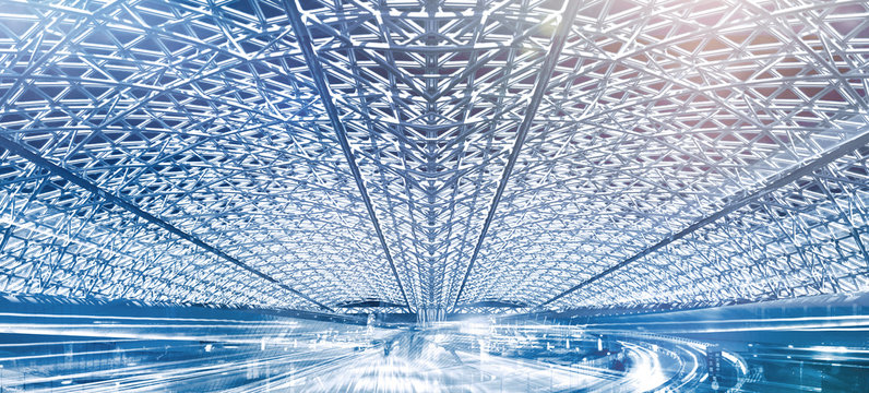 Future traffic routes under a giant ceiling made of glass and steel in a mega-city