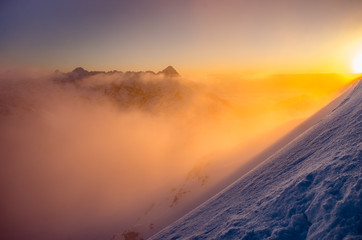 Beautiful mountain sunset panorama, cloudy Tatra mountains, Poland