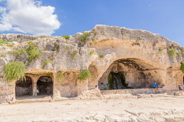 Syracuse, Sicily, Italy. Ancient artificial grotto and cave in the archaeological park of Neapolis