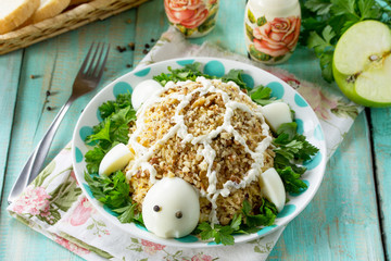 Easter recipe, festive appetizer. Salad with chicken, cheese and apple - on the festive table.