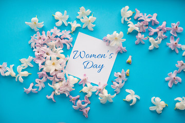 hyacinth flowers on a blue background, greeting card, woman's day