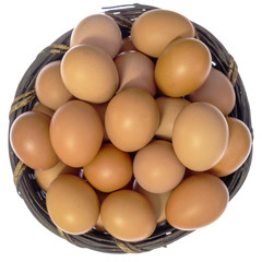 Top view of isolated eggs in basket.