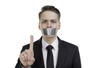 Businessman with tape on his mouth