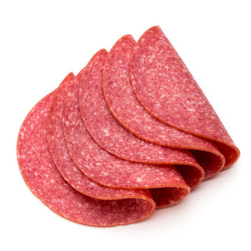 Salami slices isolated on the white background.