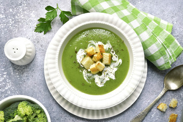 Broccoli pureed soup with croutons.Top view.