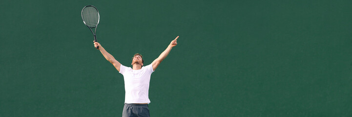 Tennis player man winning cheering celebrating victory in match point. Winner male athlete happy...