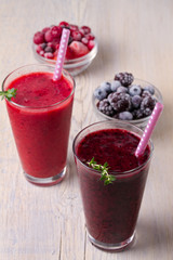 Berry smoothie, garnished with thyme