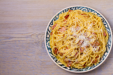 Pasta carbonara. Creamy Spaghetti Carbonara. Italian cuisine dish. View from above, top, horizontal