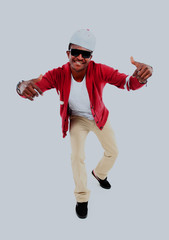 Fototapeta na wymiar African American hip hop dancer over white background.