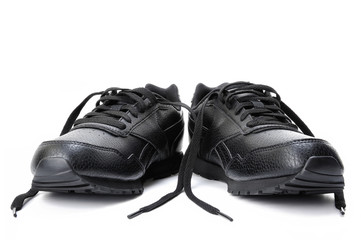 Black women's sports shoe on a white background.