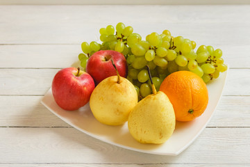 Healthy fruit mix on the kitchen table