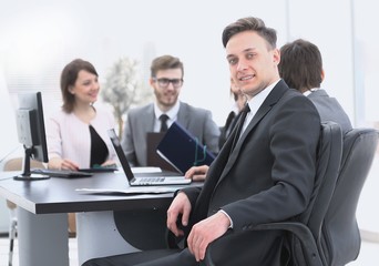 business team with a senior Manager in the foreground