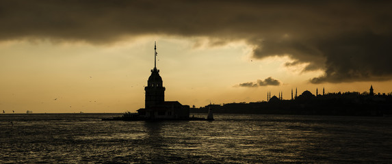 Fototapeta premium Sunset in the Maiden Tower , great colors in istanbul , Uskudar-Salacak- Turkey