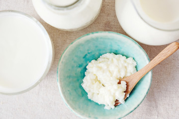 Organic probiotic milk kefir grains, Tibetan mushrooms and kefir milk in glass containers