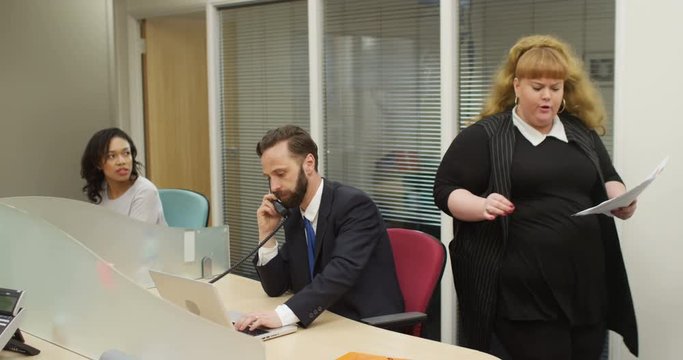 4K Overweight businesswoman with bad attitude getting into conflict with a coworker