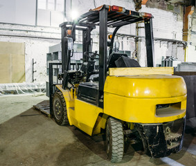 Forklift Truck inside warehouse or factory