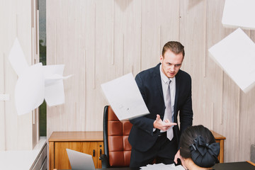  Businessman angry with his workers in office