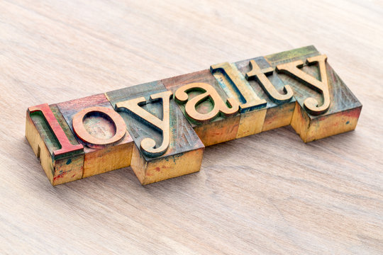 loyalty word abstract in wood type
