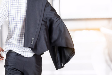 Businessman walking forward on street