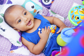 Happy Baby Boy Playing With Baby Play Gym