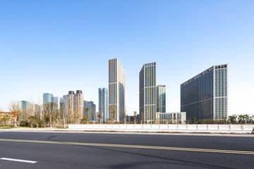 Fototapeta na wymiar modern buildings near road in modern city