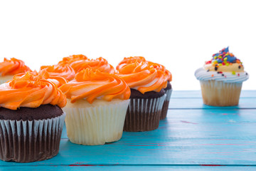 Freshly baked cupcakes with decorative icing