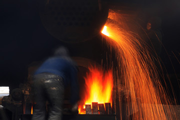 The workshop welder cuts metal