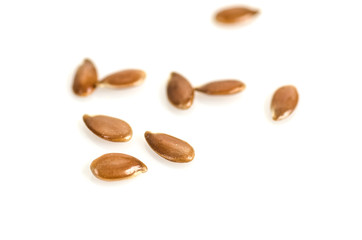 Close up of flax seeds isolated on white background