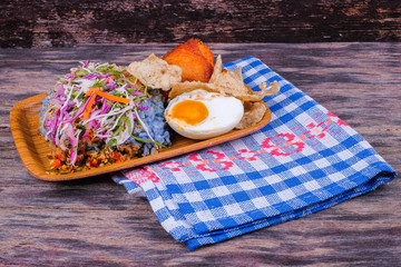 fried and mixed with rice. a combination of vegetables, duck eggs and side dishes