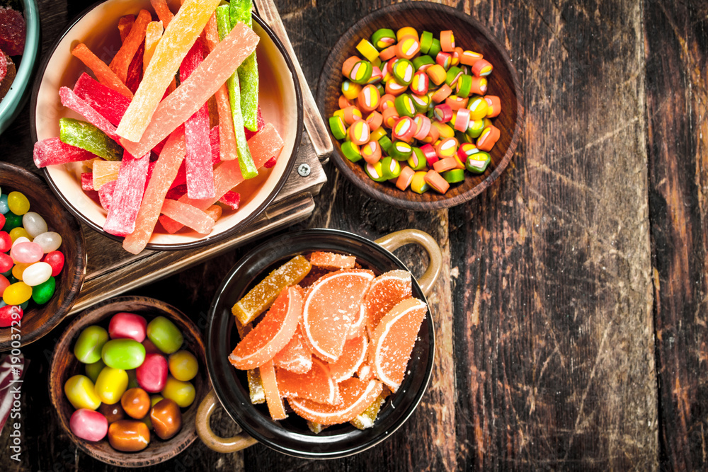 Wall mural Different sweet candy, jelly, marshmallows and candied fruits.