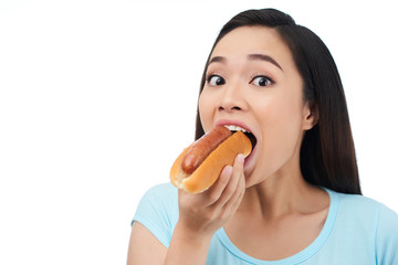 Surprised Woman Eating Hot Dog