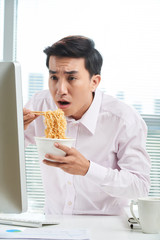 Asian Office Worker at Lunchtime