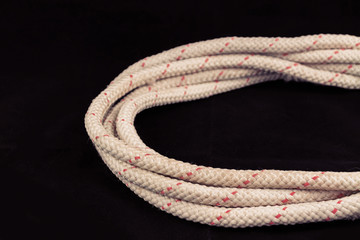Closeup of old rope on black background