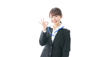OKサインを示す笑顔のビジネスウーマン