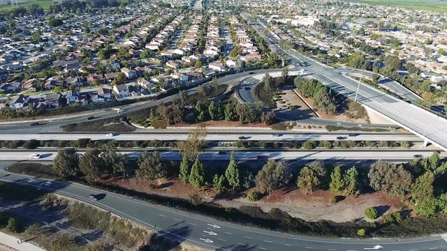 Aerial Drone View - California freeway and neighborhood scene from the air
