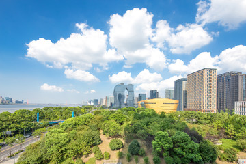 aerial view of modern city near river