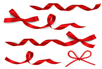 Set of beautiful red decorative bow with long curled red ribbon isolated on white background. Holyday decorations. Vector illustration - 190045074
