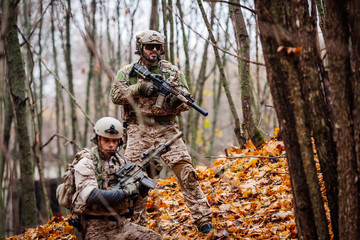rangers during the military operation with laser sights and lanterns.