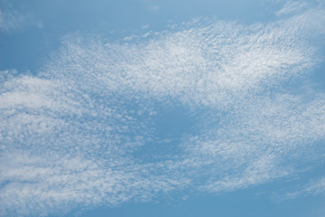 Naklejka na ściany i meble cloudy with blue sky background