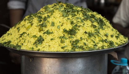 Batata Poha / Indian breakfast with potatoes and flattened rice in Nathdwara, Rajasthan India