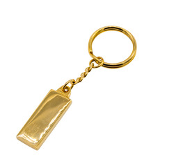 Golden key chain with chain and rings isolated on white