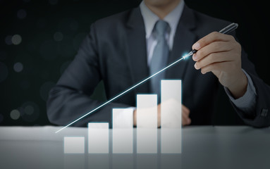 businessman present rising graph, business growth concept