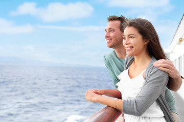 Happy interracial couple on cruise ship holiday - obrazy, fototapety, plakaty