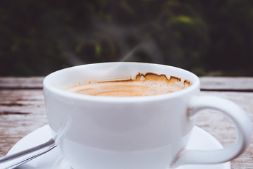 Hot Coffee on wood table