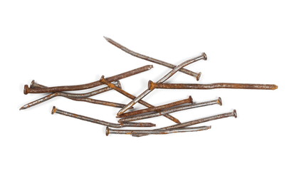 Pile of old, rusty metal nails isolated on white background, top view