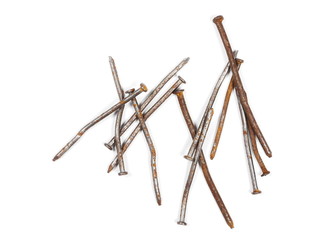 Fototapeta na wymiar Pile of old, rusty metal nails isolated on white background, top view