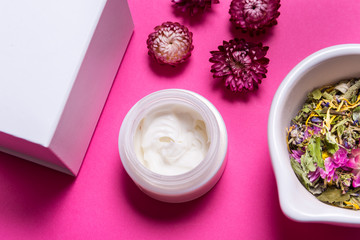 Cosmecic cream on pink background