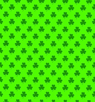 Shamrok seamless pattern on light green background vector illustration © Konstantin
