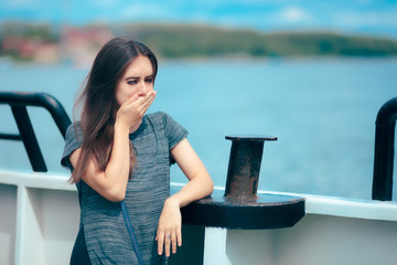 Sea sick woman suffering motion sickness while on boat - obrazy, fototapety, plakaty